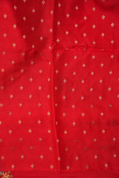 Bright Red Crepe silk saree with French knot work.