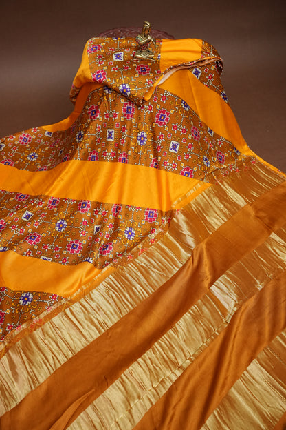 Gajji Silk Saree with Mustard Yellow Panels & Warm Caramel Brown Patola Prints