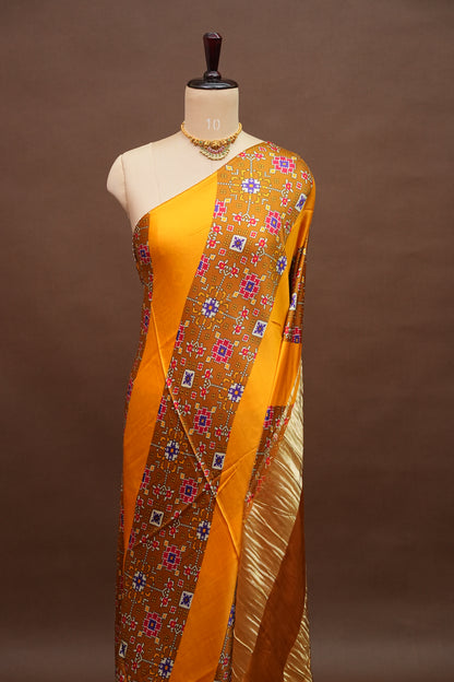 Gajji Silk Saree with Mustard Yellow Panels & Warm Caramel Brown Patola Prints