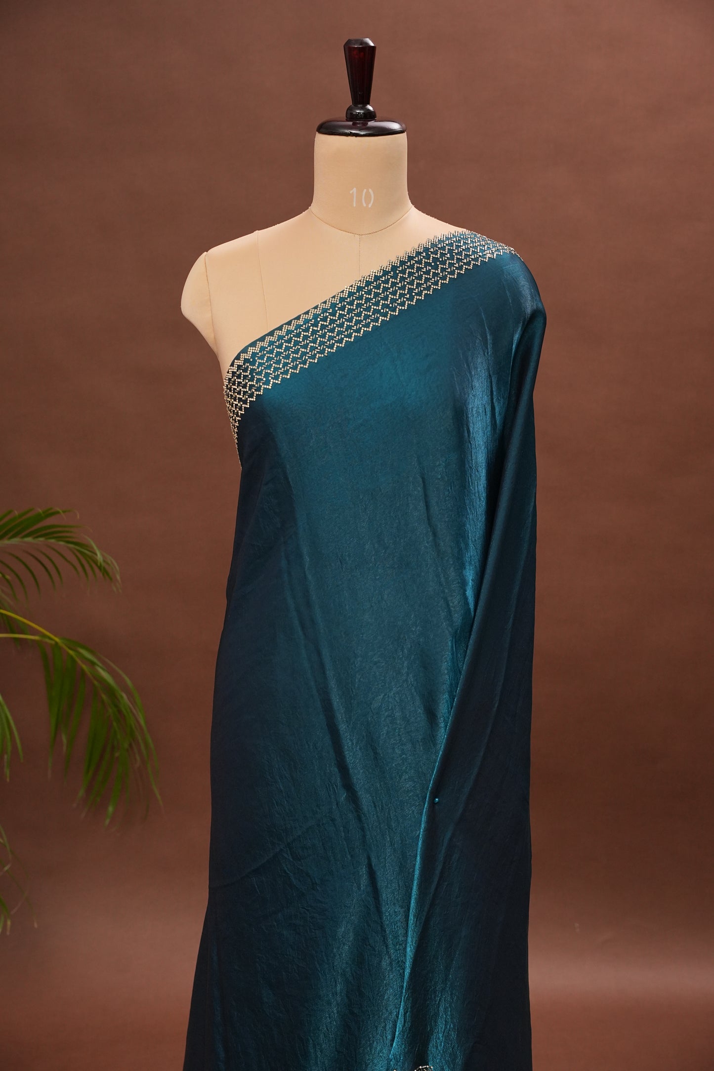 Teal Blue Party Wear Saree with Geometric Hand Embellished Detailing