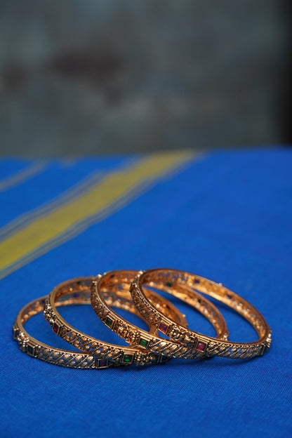 Antique Gold-Plated Temple Bangles Set – Ruby & Emerald Stone Details | Set of 4