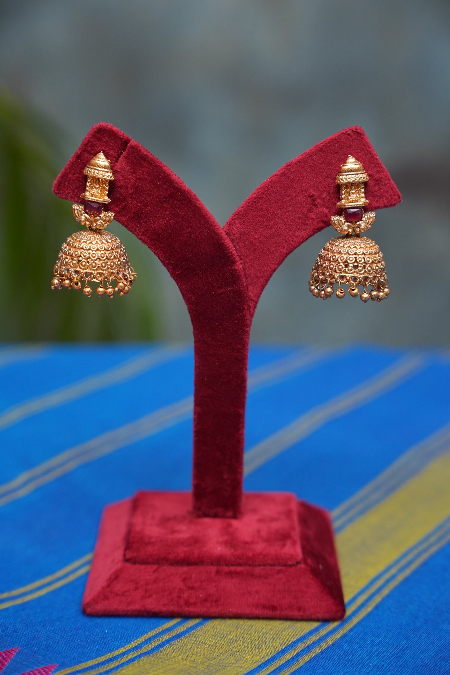 Antique Gold Plated Jhumka with Ruby Stud and Lakshmi Detailing