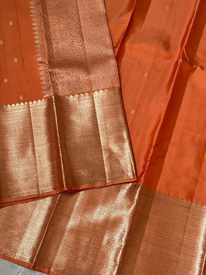 Dark Peach Pure Kanchipuram Silk Saree with Silver Zari Motifs Silk Mark Certified