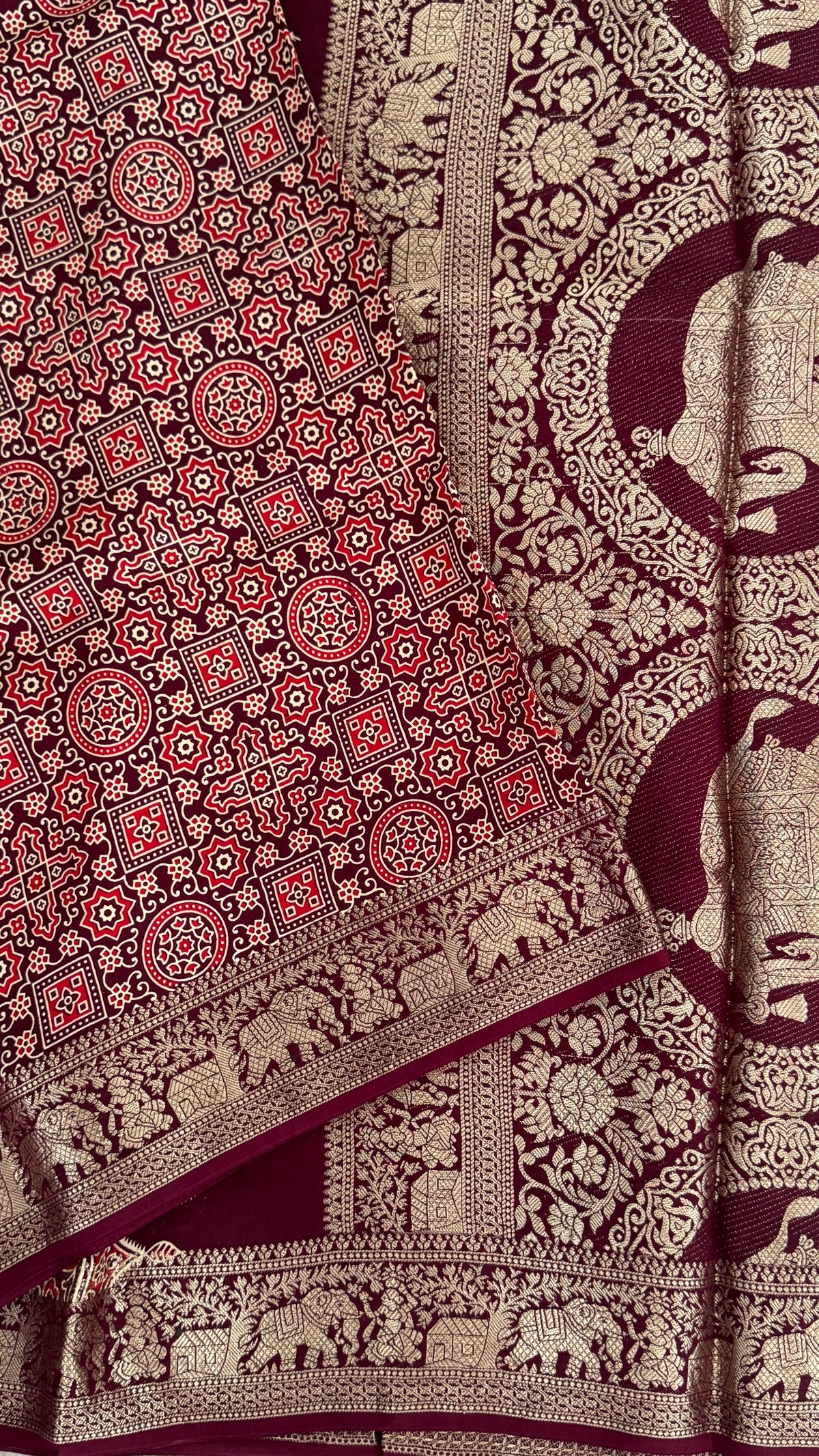 Pure Modal Based Saree with Ajrakh Prints & Banarasi Elephant Zari Border – Deep Maroon
