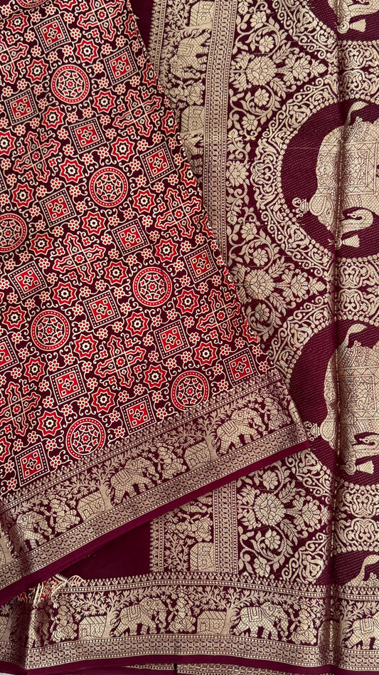 Pure Modal Based Saree with Ajrakh Prints & Banarasi Elephant Zari Border – Deep Maroon