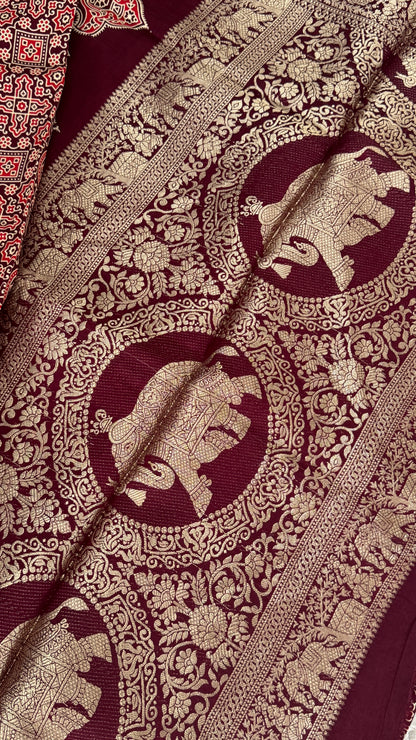 Pure Modal Based Saree with Ajrakh Prints & Banarasi Elephant Zari Border – Deep Maroon