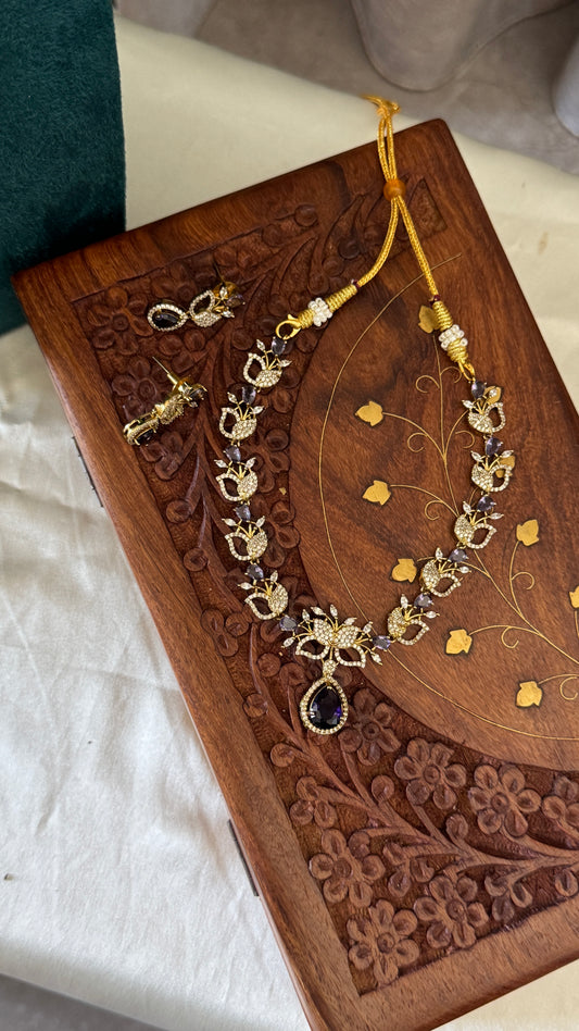 Handcrafted Necklace and Earring Set with AD Stones - White and Purple stones
