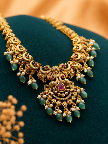 Antique Gold Peacock-Inspired Long Haaram Set with Green Bead Drops