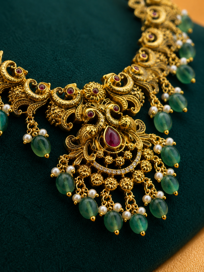 Antique Gold Peacock-Inspired Long Haaram Set with Green Bead Drops